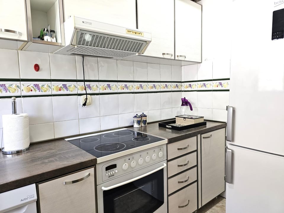 Kitchen or kitchenette, stove