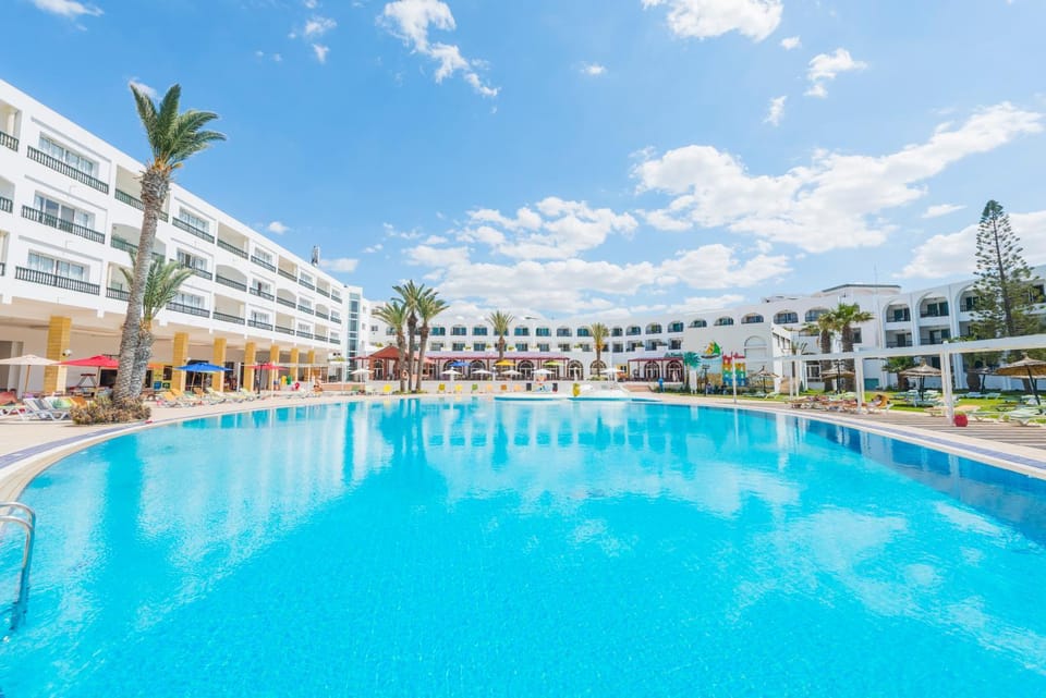 Property building, Pool view, Swimming pool, sunbed