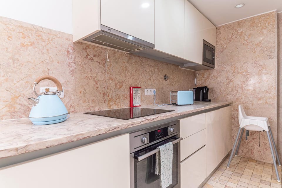 Kitchen or kitchenette, oven, stove