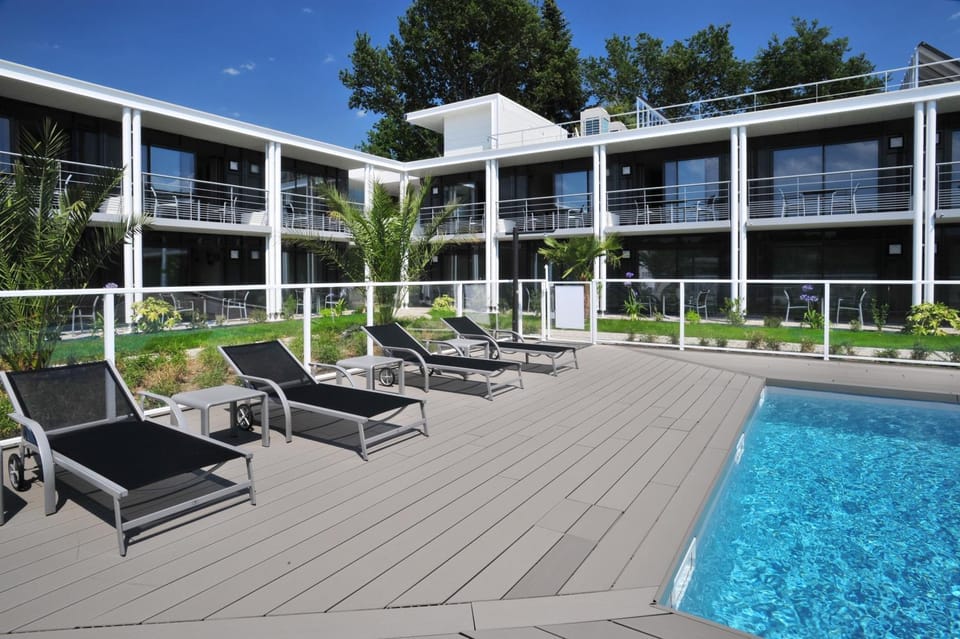 Property building, Patio, Day, Swimming pool, Swimming pool