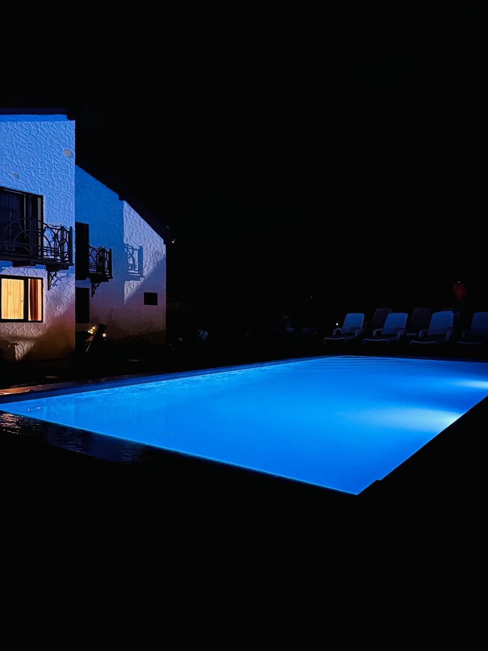 Property building, Night, Pool view, Swimming pool, sunbed