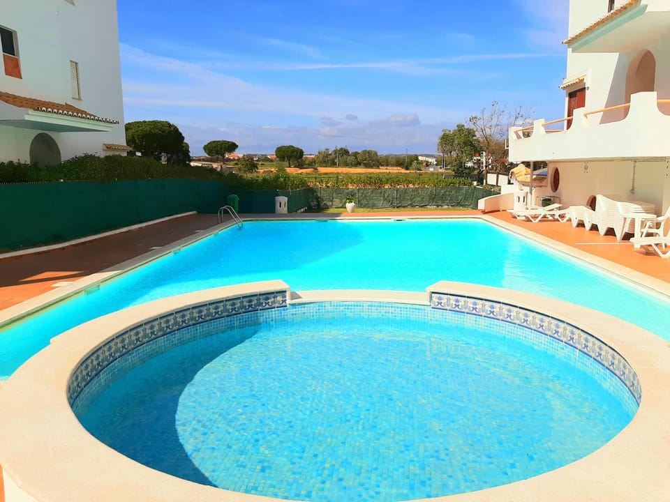 Swimming pool, sunbed