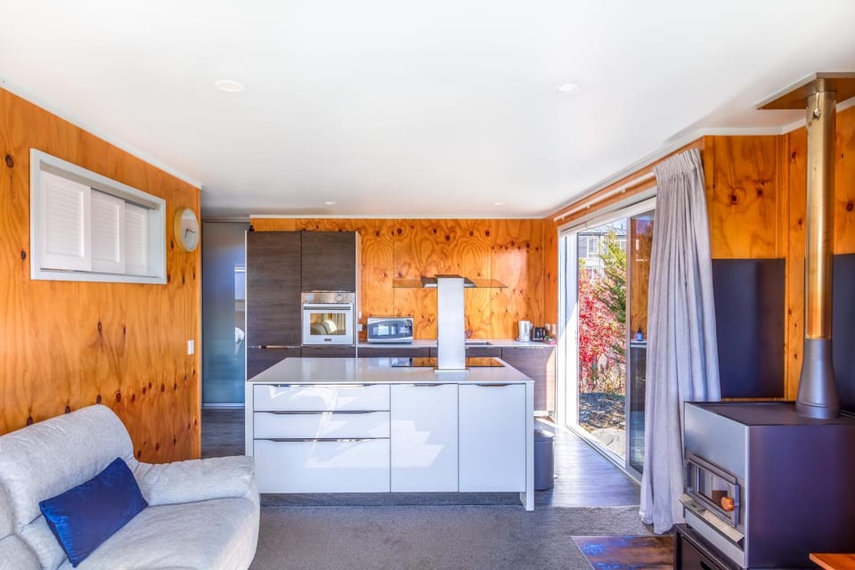 Kitchen or kitchenette, dishwasher, oven, stove