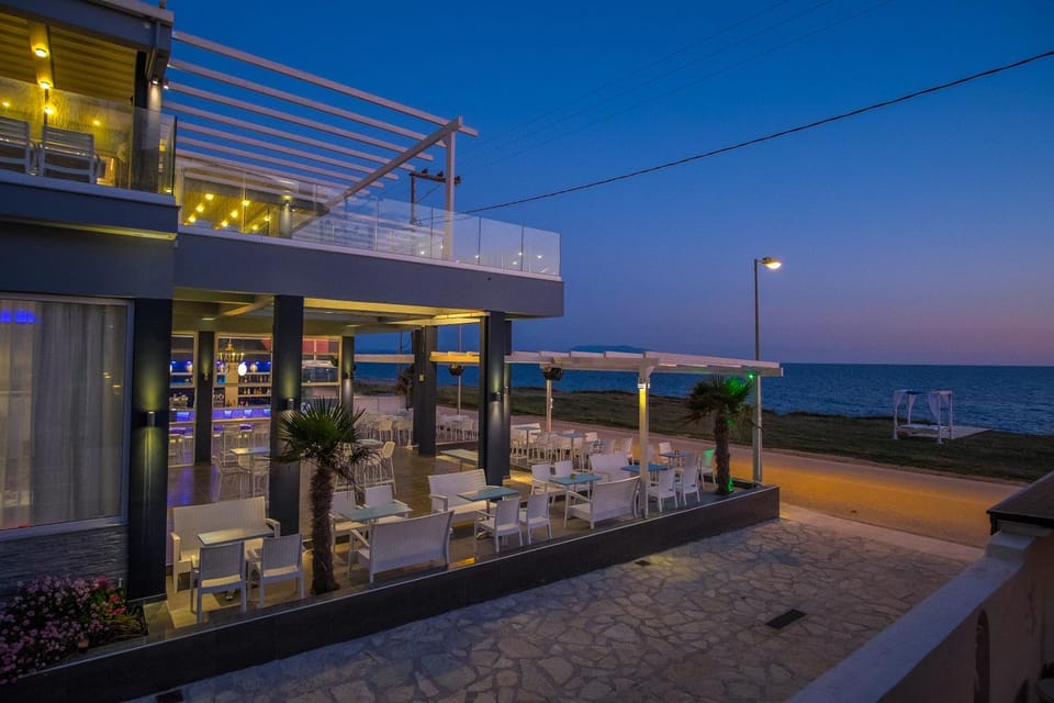 Patio, Nearby landmark, Restaurant/places to eat, Facade/entrance, Spring, People, People, Property logo or sign, Neighbourhood, Natural landscape, Activities, Summer, Nightclub / DJ, View (from property/room), Decorative detail, Beach, Beach, Hiking, Evening entertainment, Logo/Certificate/Sign, Logo/Certificate/Sign, On site, Text overlay, Text overlay, Guests, Guests, Sea view, Street view, Area and facilities, Area and facilities, Sports, Entertainment, Location, Sunset, children, children