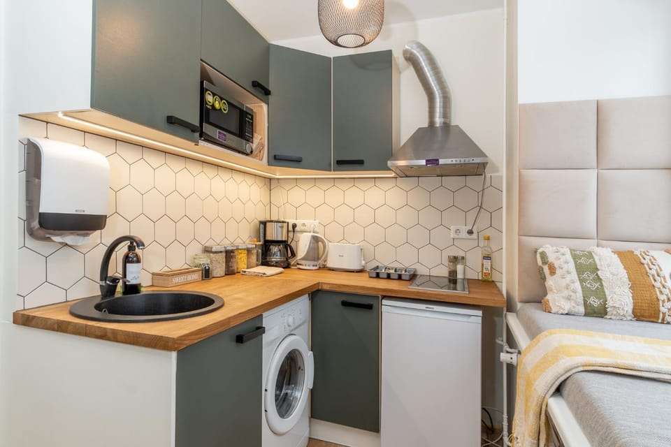 Coffee/tea facilities, Kitchen or kitchenette, minibar, stove, toaster, washing machine