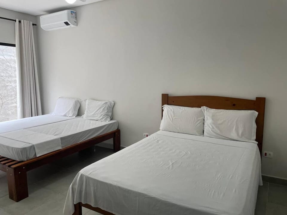 Bed, air conditioner