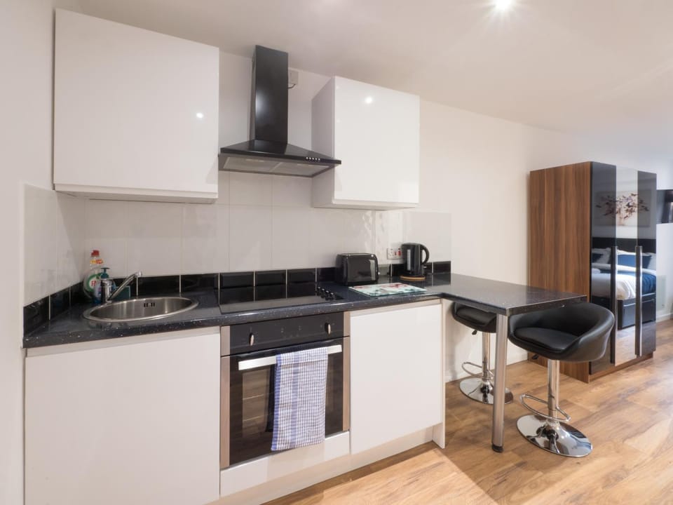 Kitchen or kitchenette, Dining area, oven, stove, toaster