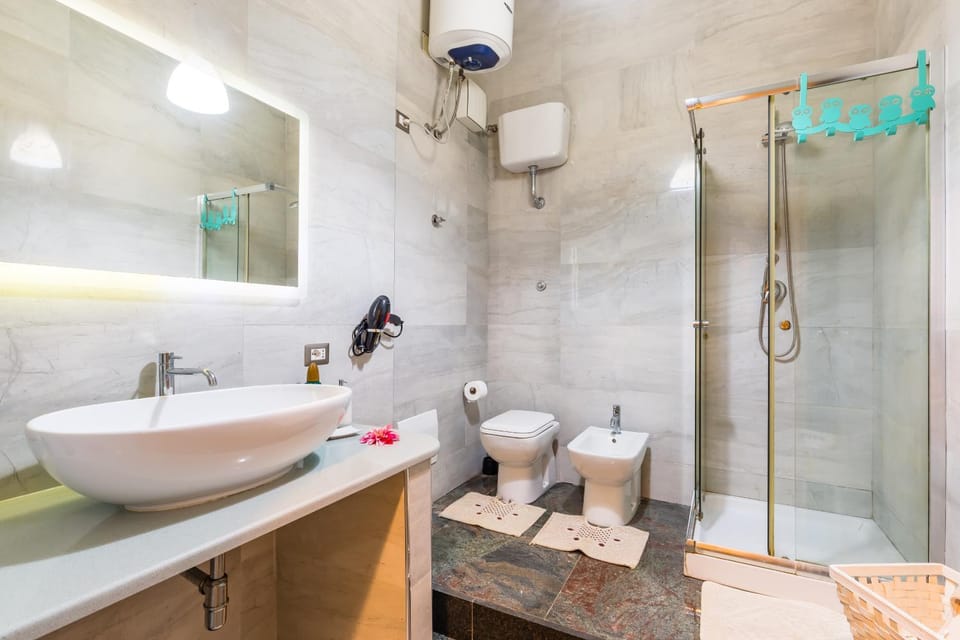 Bathroom, bidet, furniture, heating, towels, air conditioner