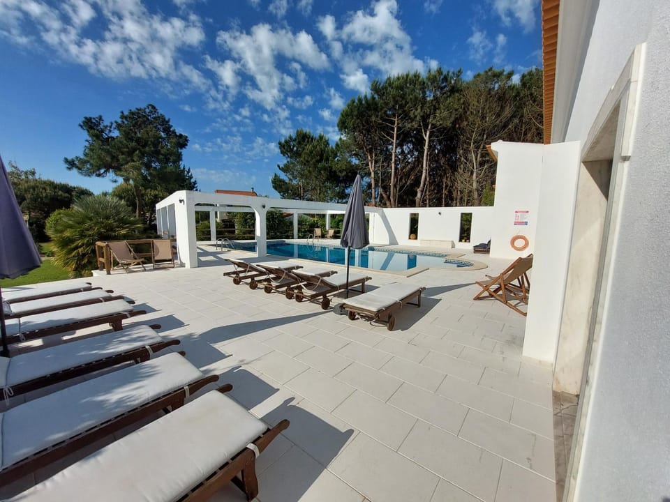 Swimming pool, sunbed