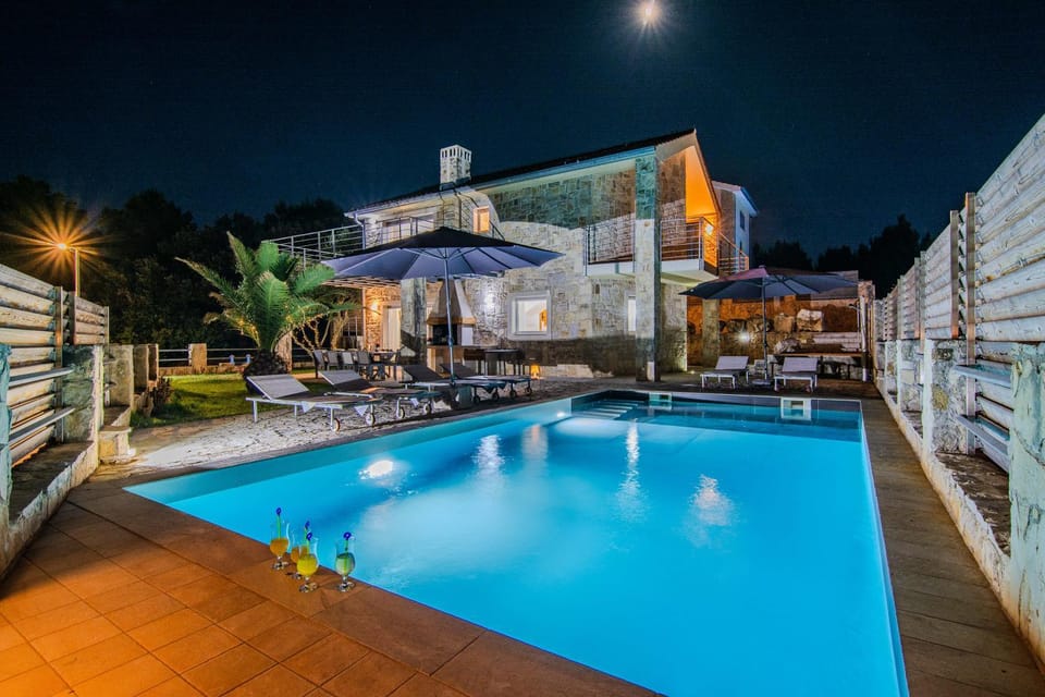 Property building, Night, Pool view, Swimming pool, Swimming pool, sunbed