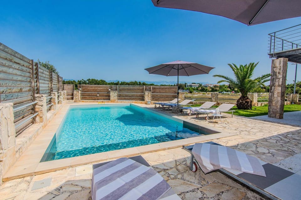 Patio, Day, Natural landscape, Pool view, Swimming pool, Swimming pool, sunbed