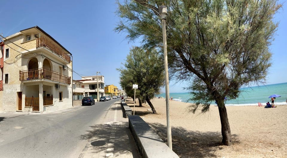 Property building, Day, Neighbourhood, Natural landscape, Beach, Sea view, Street view