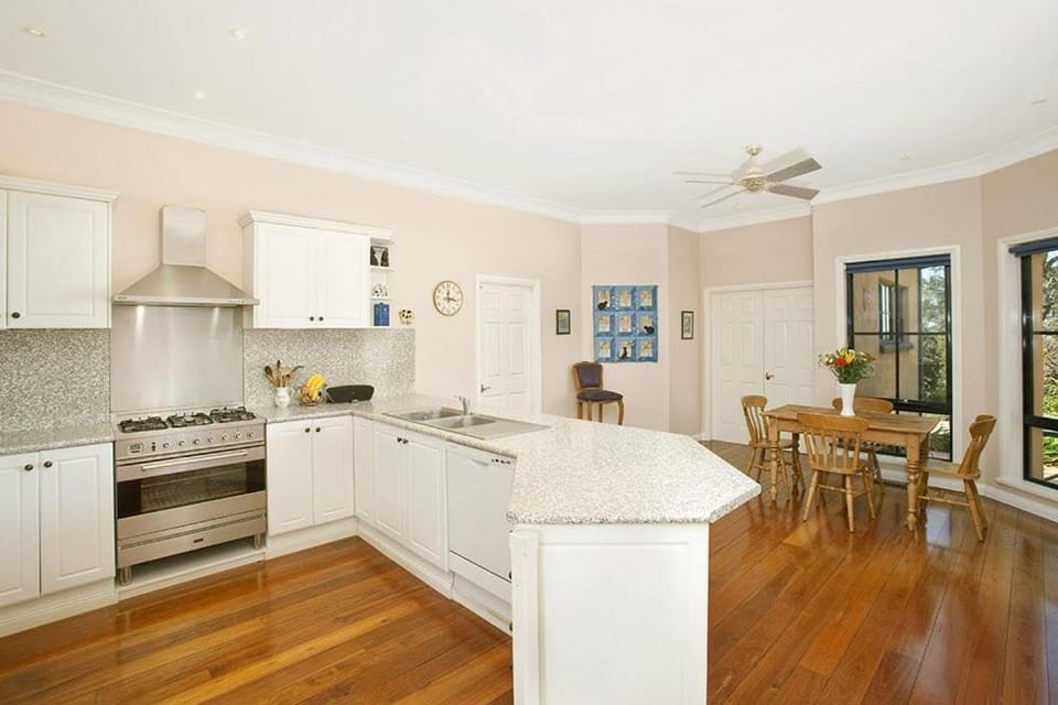 Kitchen or kitchenette, dishwasher, oven, stove