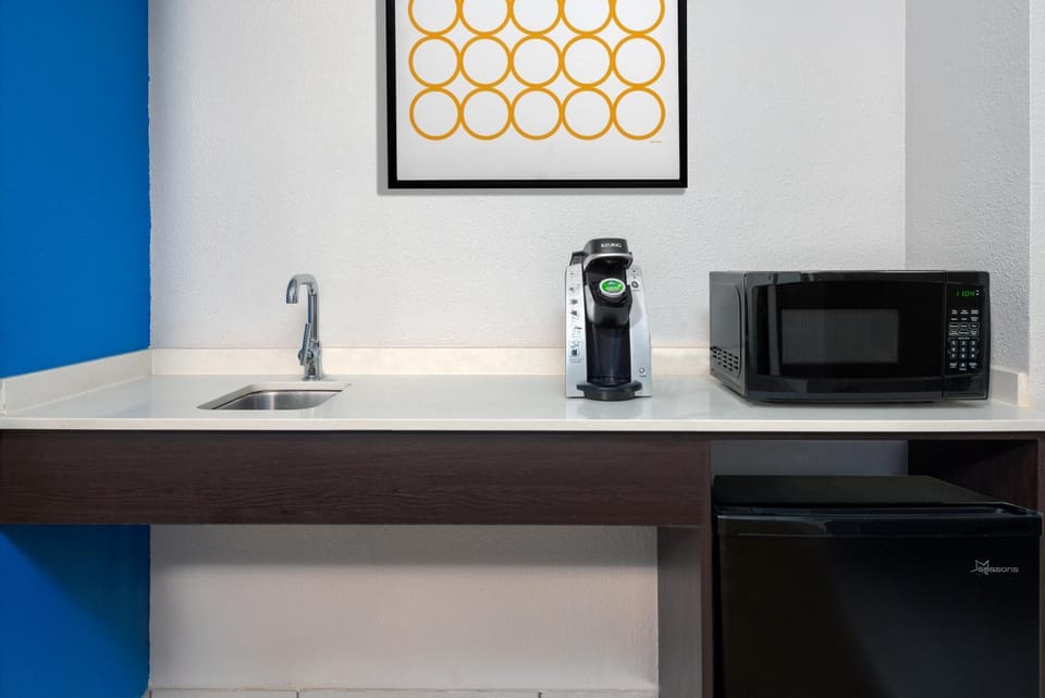 Kitchen or kitchenette, microwave