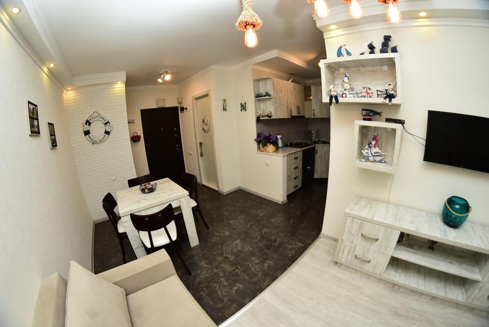 Coffee/tea facilities, Kitchen or kitchenette, Living room, Decorative detail, Seating area, Dining area