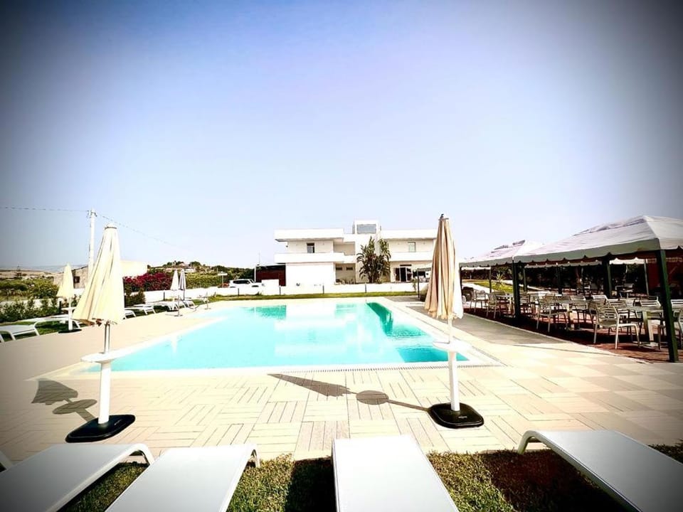 Property building, Facade/entrance, Pool view, Swimming pool, Swimming pool