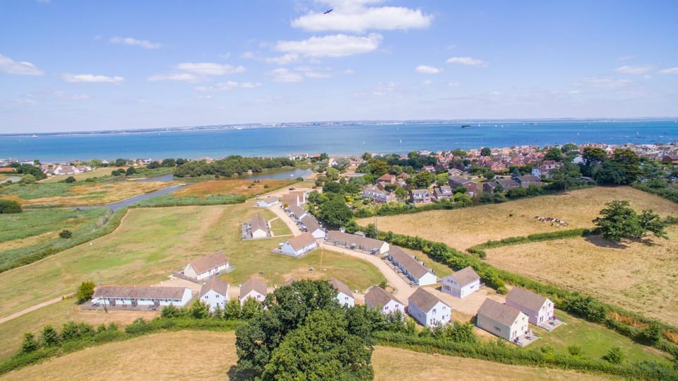 Property building, Natural landscape, Bird's eye view, View (from property/room), Garden view, Lake view, Sea view