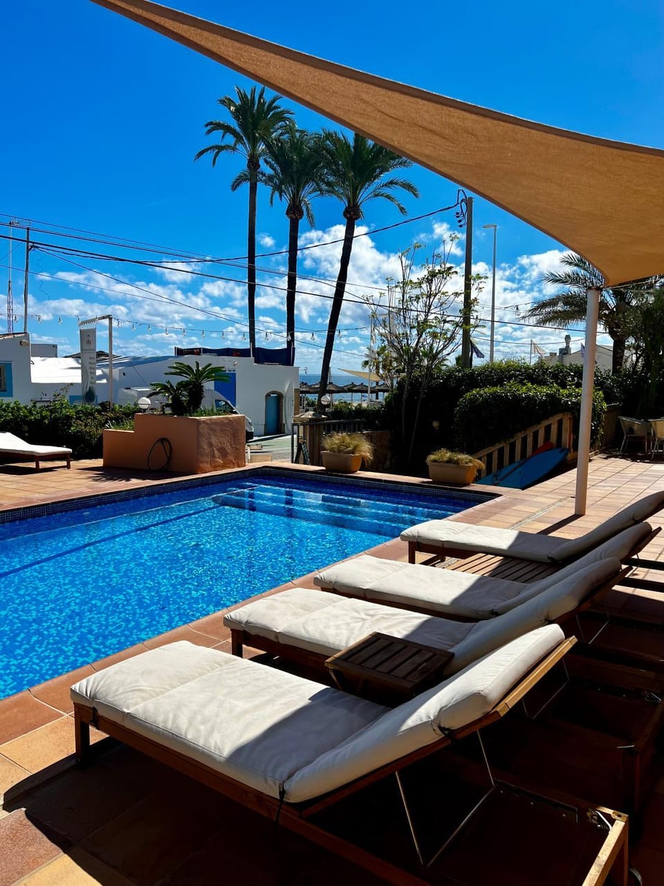 Patio, Day, Natural landscape, Pool view, Swimming pool, sunbed