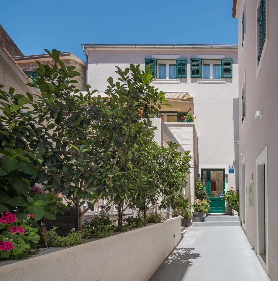 Property building, Facade/entrance, View (from property/room), Balcony/Terrace, Garden view