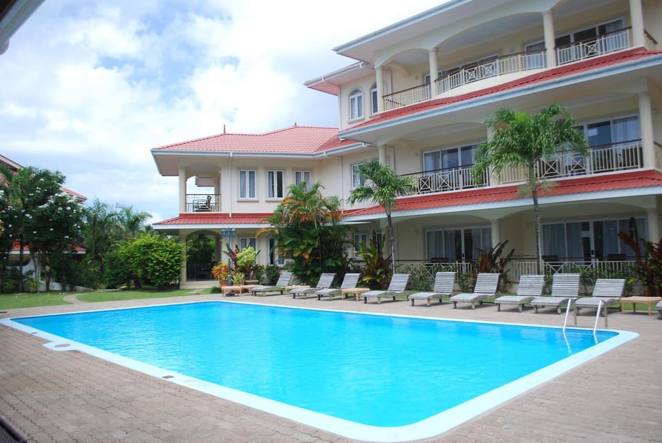 Property building, Floor plan, Pool view, Swimming pool, sunbed