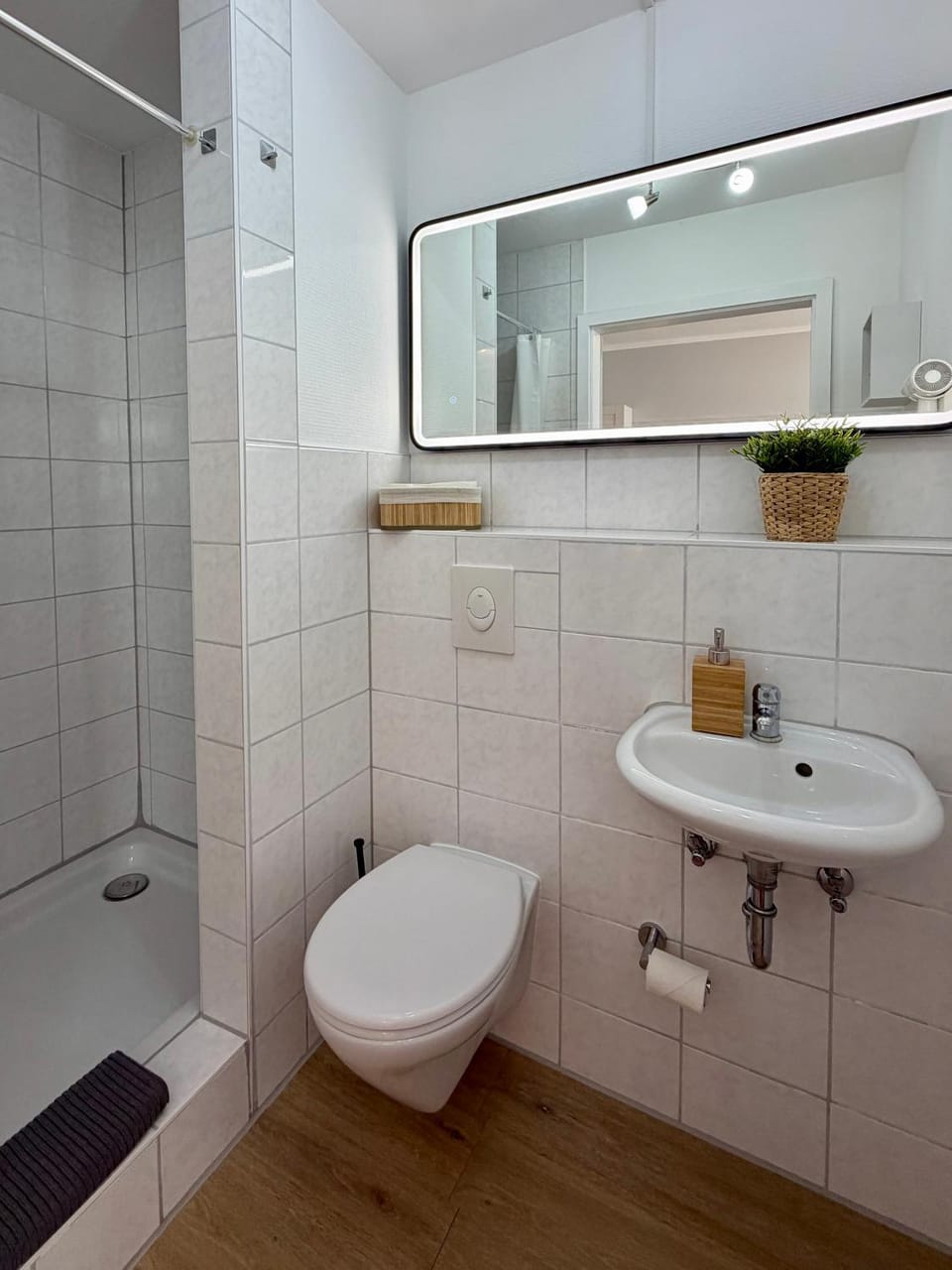 Shower, Toilet, Bathroom, hair dryier, towels