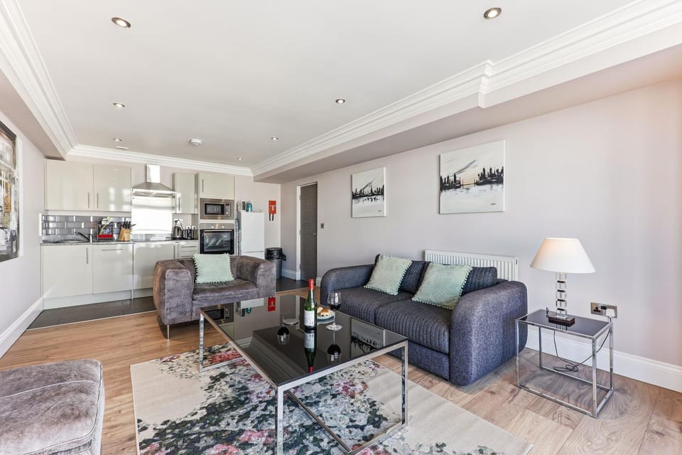 Kitchen or kitchenette, Living room, dishwasher, oven, stove, washing machine, dryer