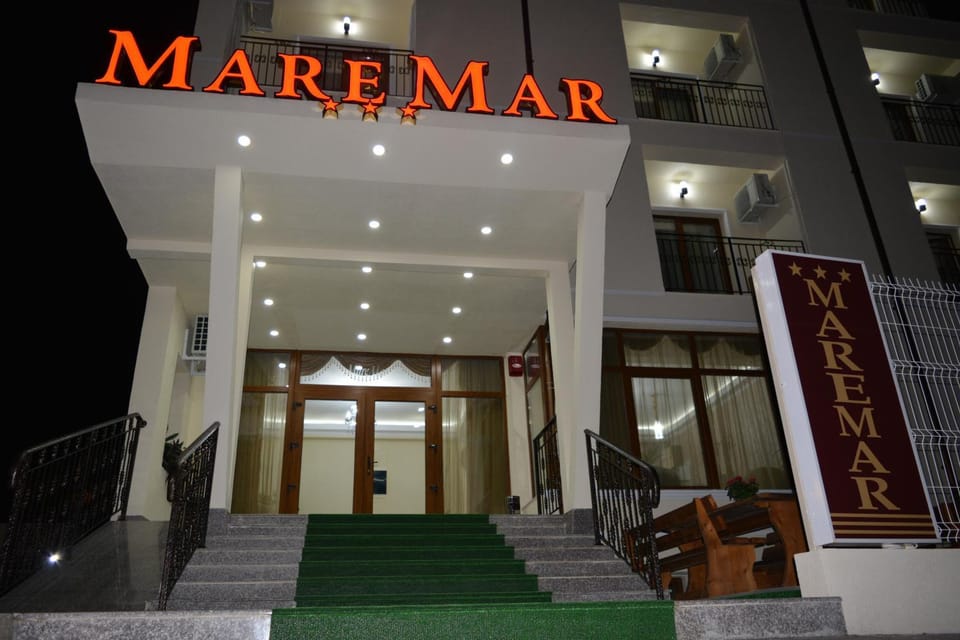 Facade/entrance, Facade/entrance, Night, Property logo or sign