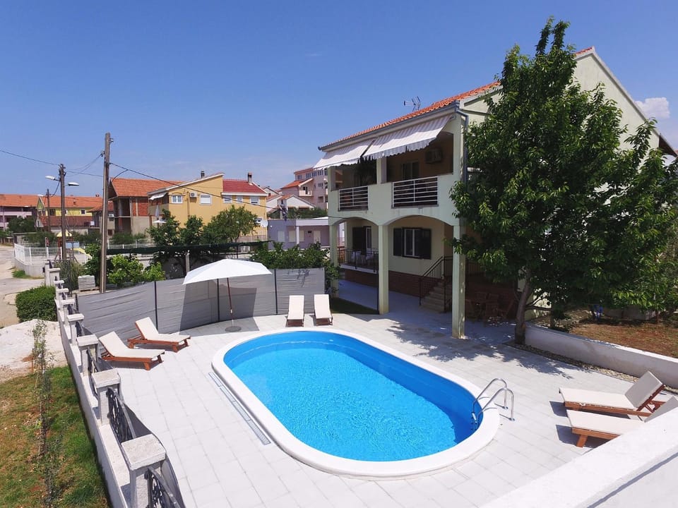 Property building, Pool view, Swimming pool, Swimming pool