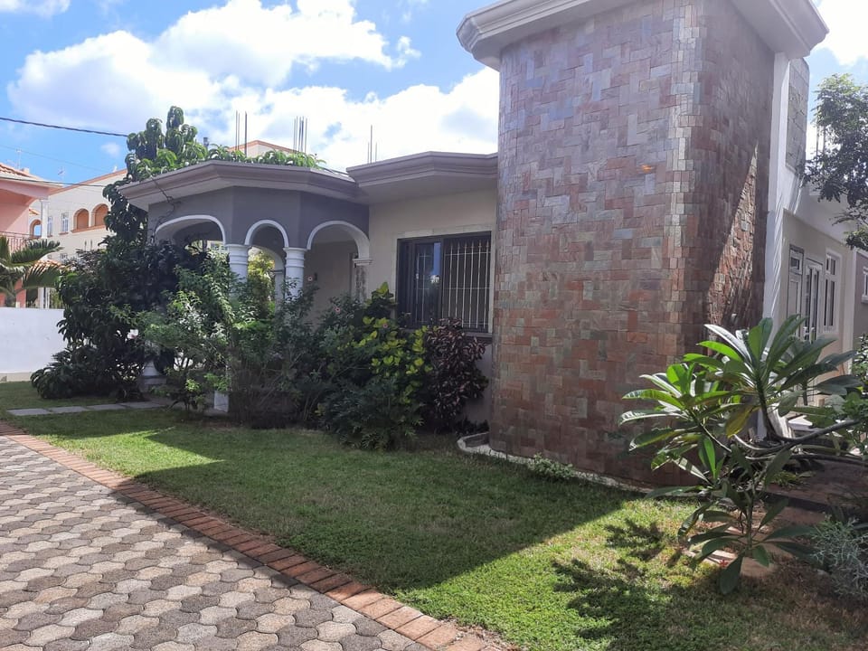 Cardamon Villa is a 2 bedroom with 1 bathroom and seperate toilet detached house with AC and swimming pool , 5 minutes walk from Flic en Flac public beach Villa in Flic en Flac