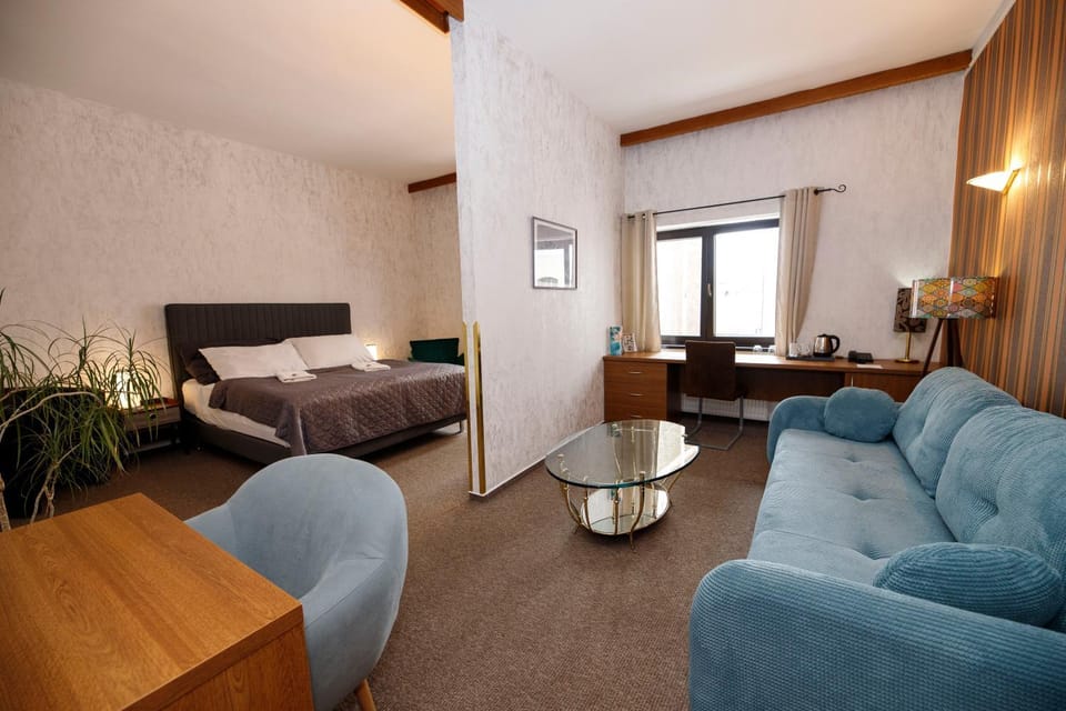 Bed, Living room, Seating area, Bedroom