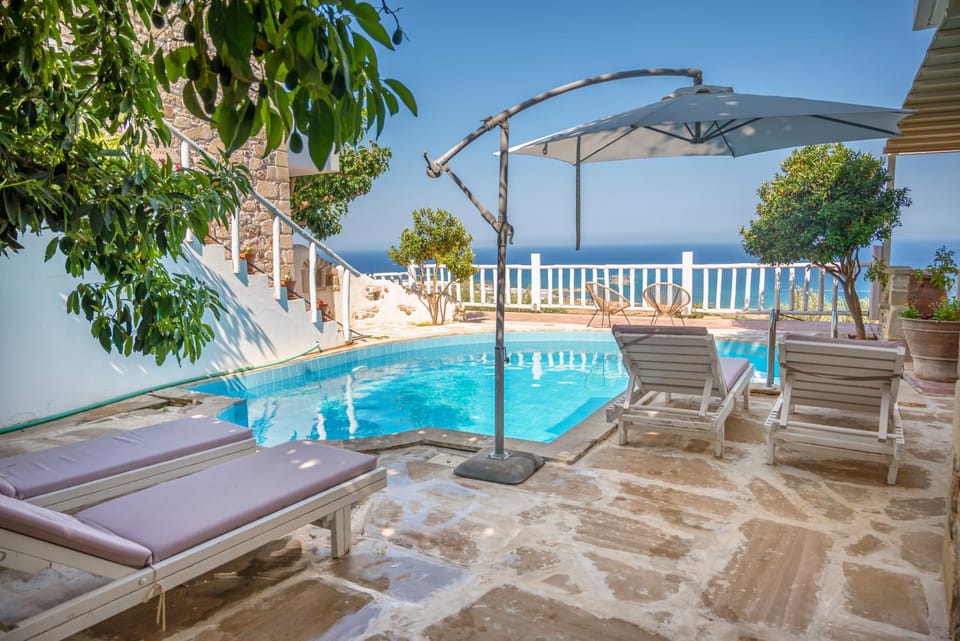 View (from property/room), Pool view, Sea view, Swimming pool, sunbed