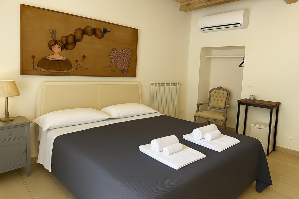 Bed, Photo of the whole room, Bedroom, towels, air conditioner