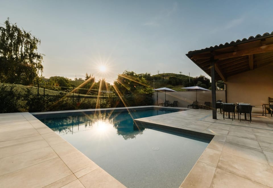 Patio, Natural landscape, Pool view, Swimming pool, Sunset, sunbed