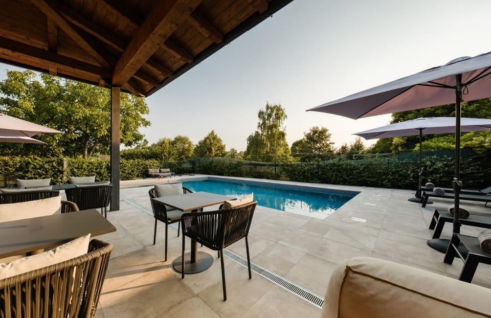 Patio, Natural landscape, Garden, Pool view, Swimming pool, sunbed