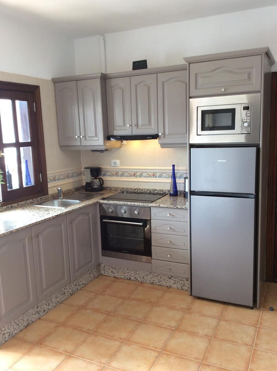 Kitchen or kitchenette, oven, stove, toaster