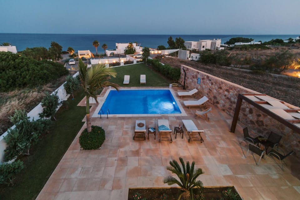 Property building, Patio, Day, Natural landscape, Pool view, Sea view, Swimming pool, sunbed
