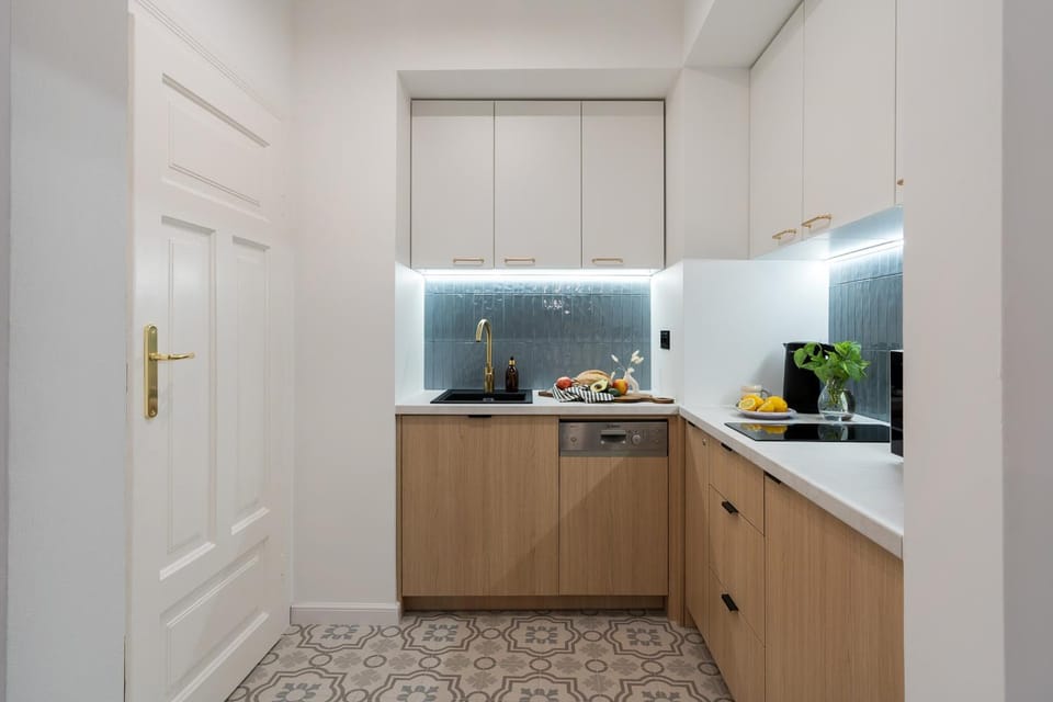 Kitchen or kitchenette, dishwasher, microwave, oven, stove