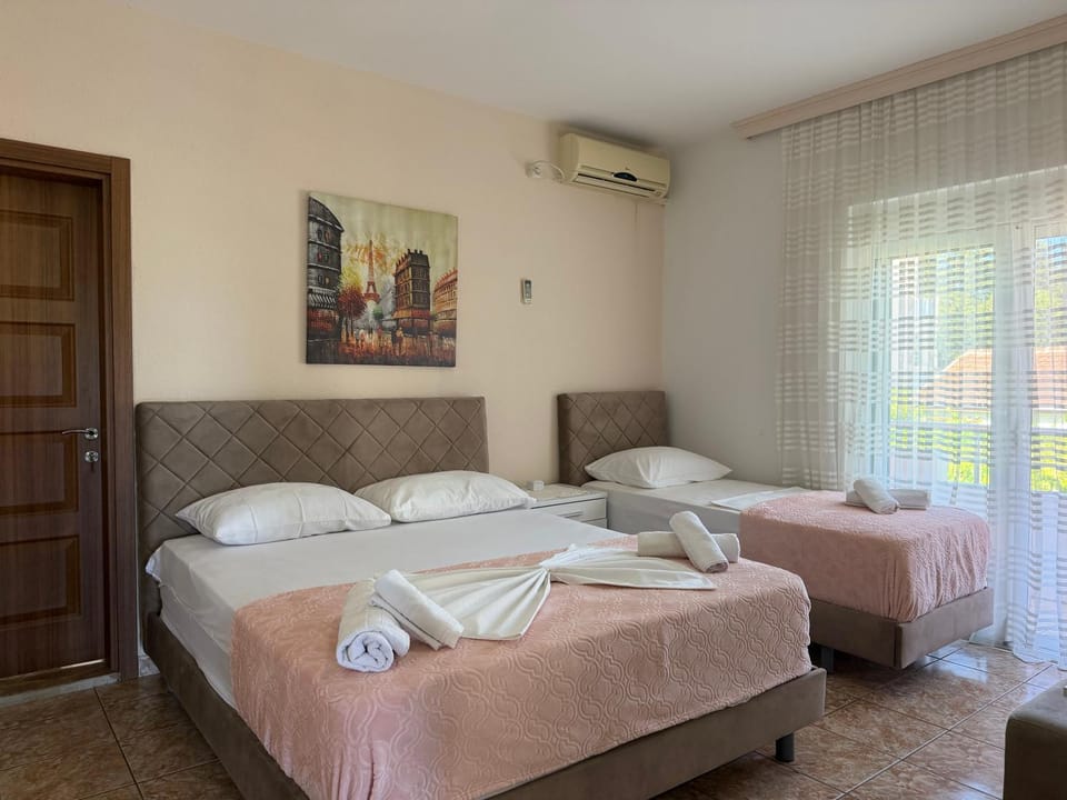 Bed, Photo of the whole room, Bedroom, towels, air conditioner