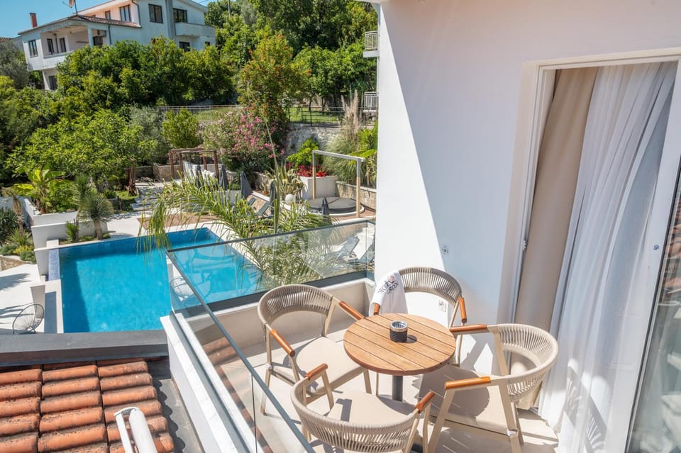 Property building, Patio, Day, View (from property/room), Balcony/Terrace, Pool view, Swimming pool, sunbed