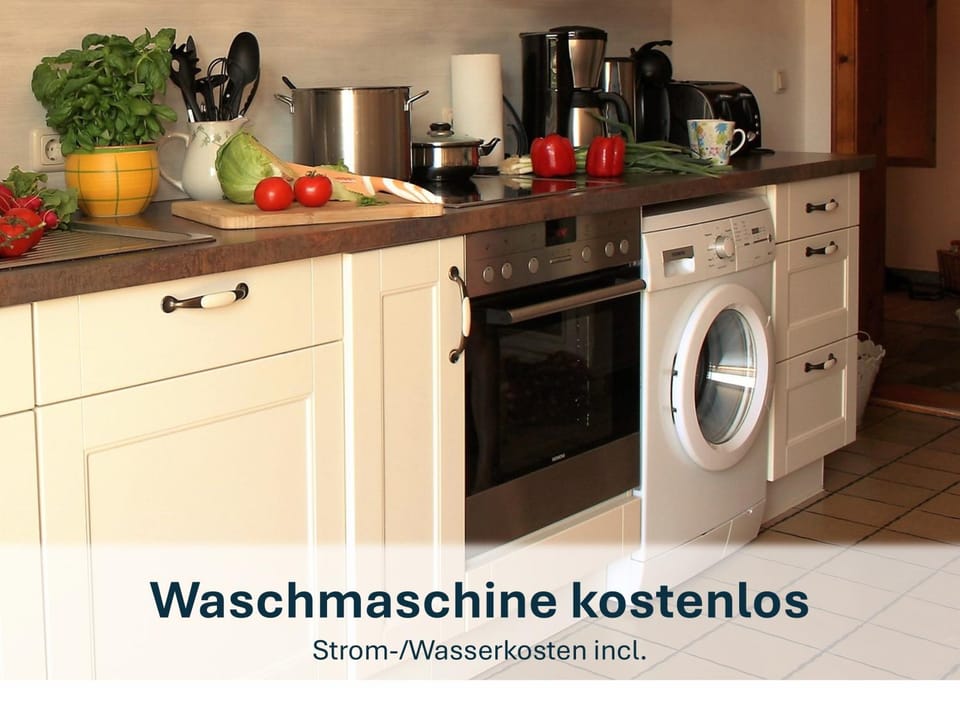 Kitchen or kitchenette, dishwasher, stove, washing machine