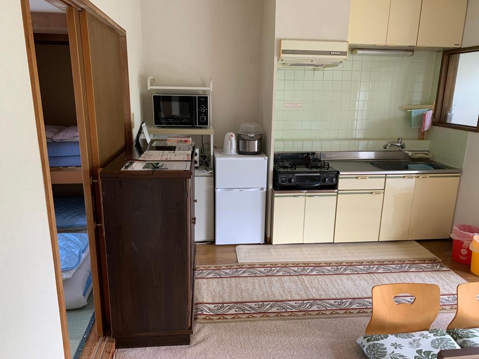 Kitchen or kitchenette, stove, toaster