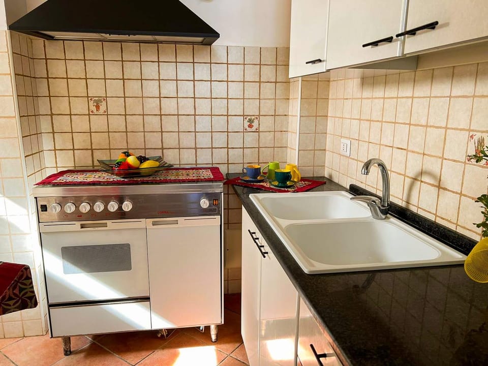 Kitchen or kitchenette, stove
