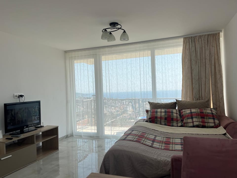 Bed, Seating area, Sea view