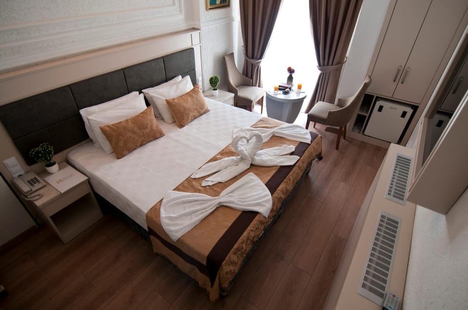 Bed, Photo of the whole room, Bedroom, towels, air conditioner