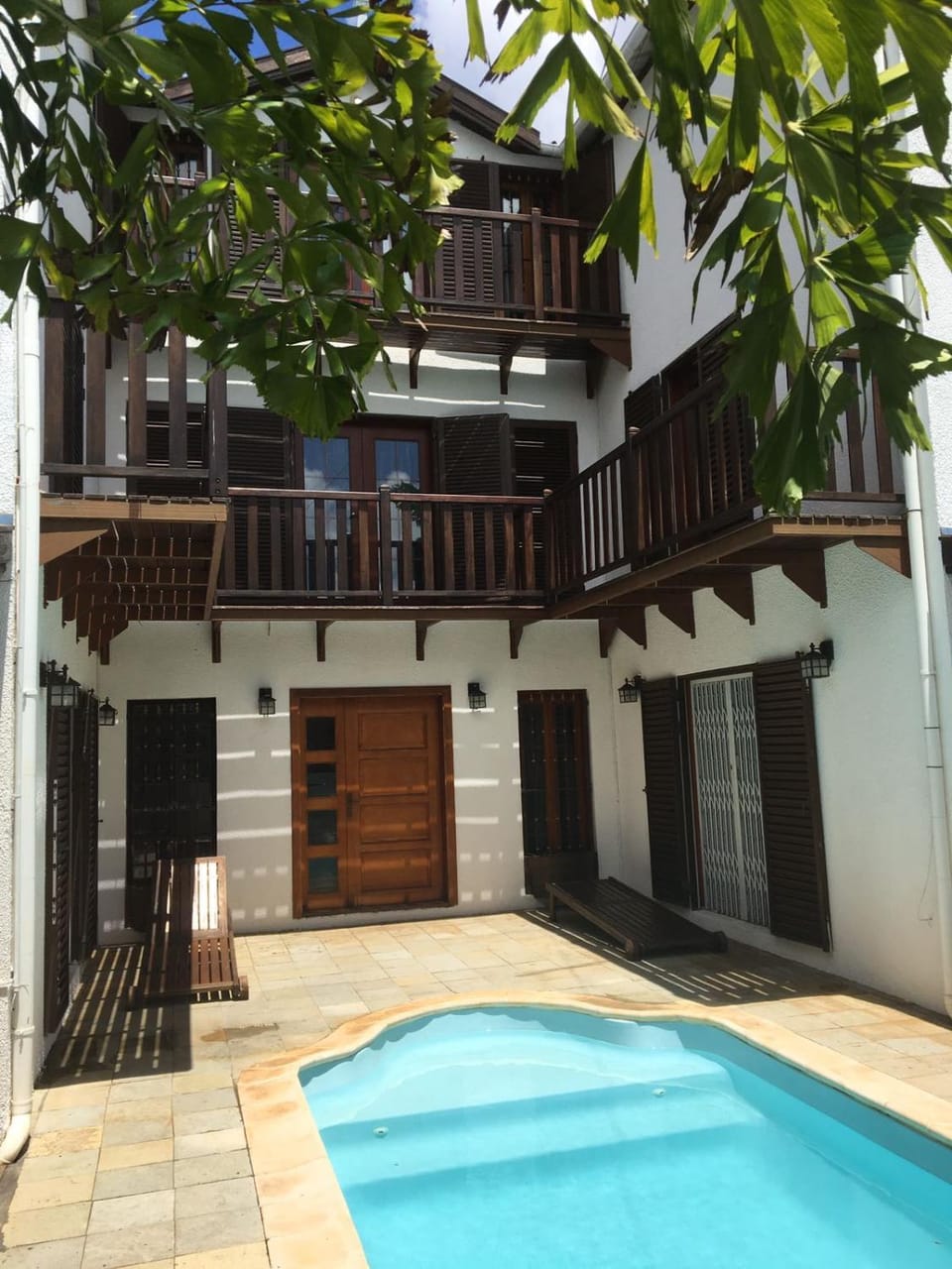 Property building, Patio, Facade/entrance, Day, Balcony/Terrace, Pool view, Swimming pool