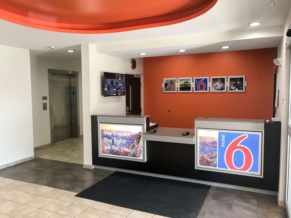 Communal lounge/ TV room, Property logo or sign, Lobby or reception, On site