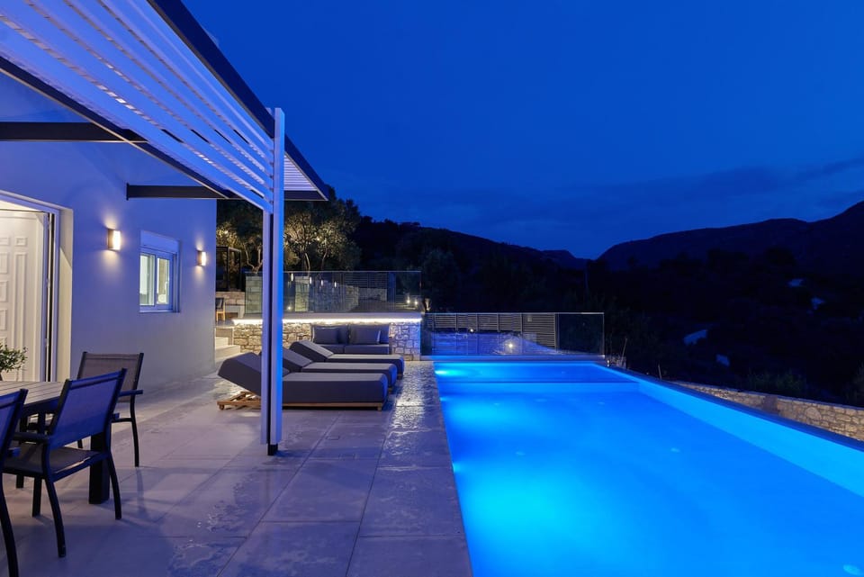 Patio, Night, Natural landscape, Mountain view, Pool view, Swimming pool, sunbed