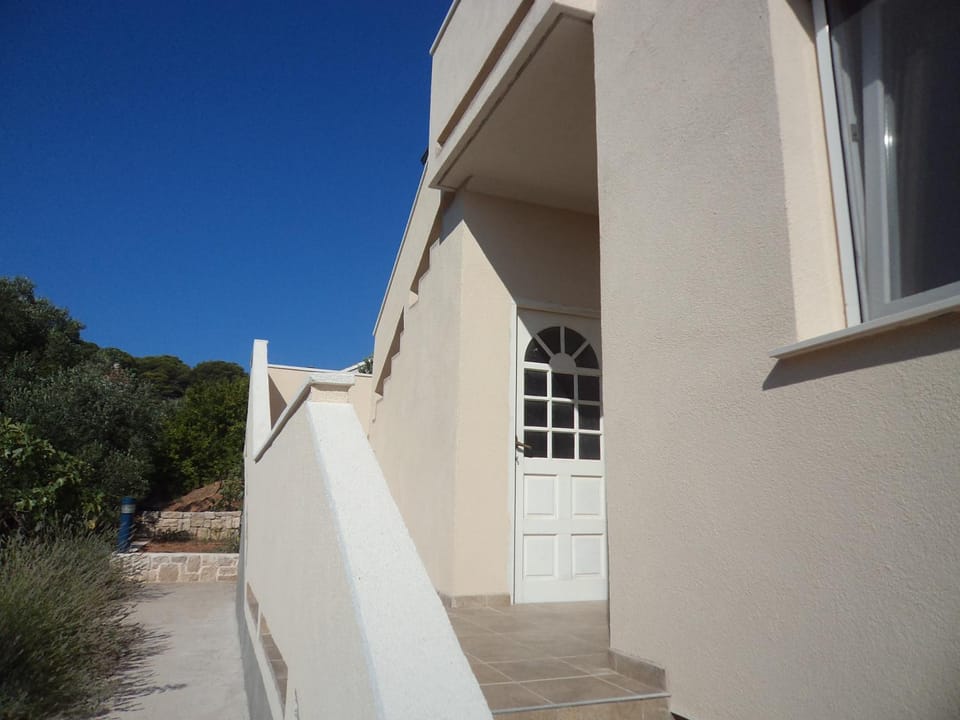 Facade/entrance, Off site, Summer, Sunrise
