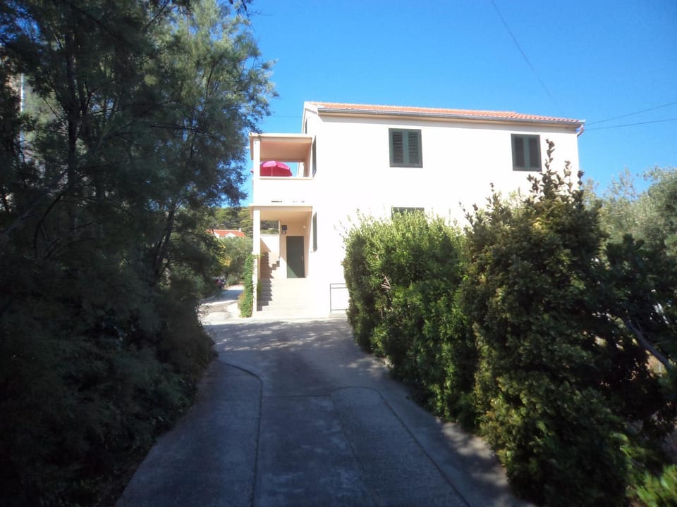 Facade/entrance, Off site, Neighbourhood, Summer, Sunrise