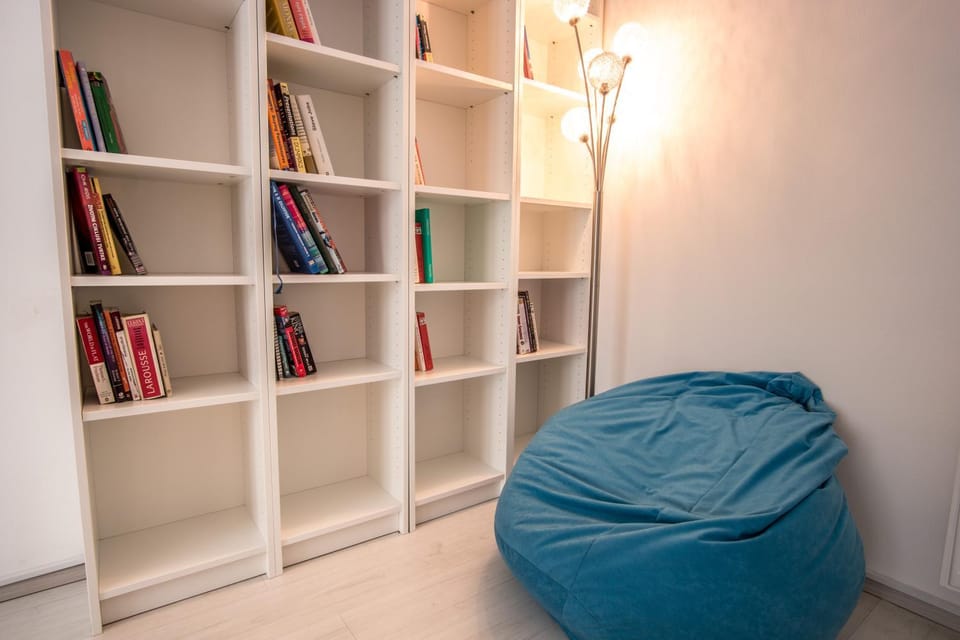 Library, Living room, Seating area, Entertainment